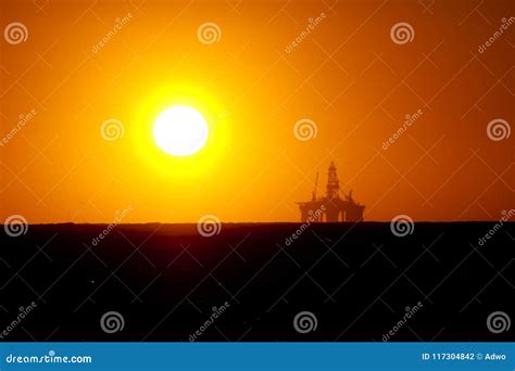 Oil Rig Sunset stock photo. Image of petroleum, blue - 117304842