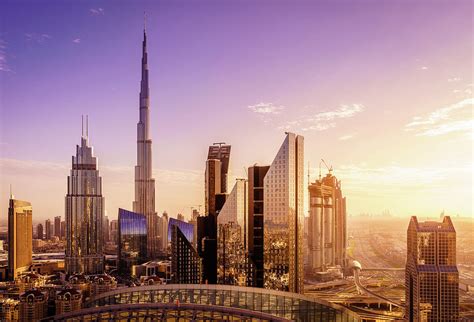 Dubai downtown skyline at sunset Photograph by Alexey Stiop - Fine Art America