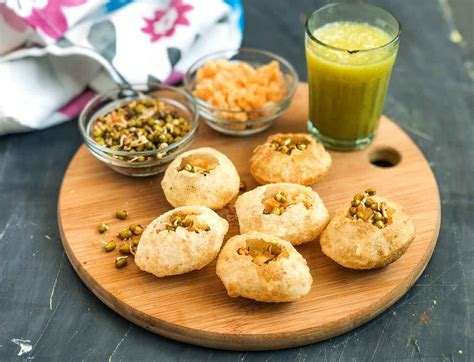 Aam Panna Pani Puri Recipe uses diluted aam panna filled in the puris, makes a great mouth ...