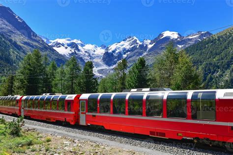 Swiss mountain train crosses the Alps 2122842 Stock Photo at Vecteezy