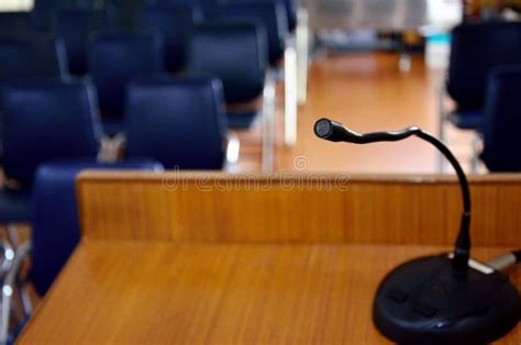 Microphone on Wooden Podium Stock Image - Image of podium, conference: 31678417