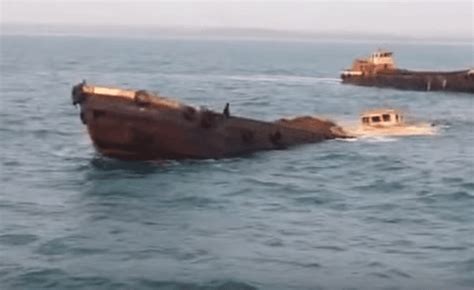 Watch: Raw Video Of Loaded Barge Sinking