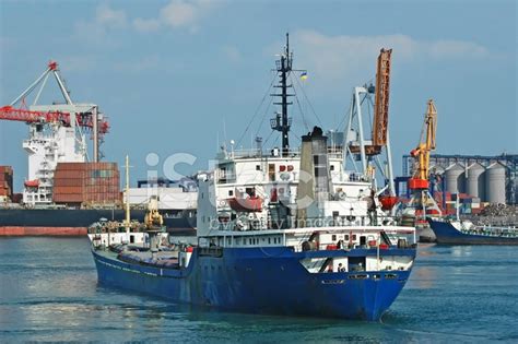 General Cargo Ship And Port Crane Stock Photo | Royalty-Free | FreeImages