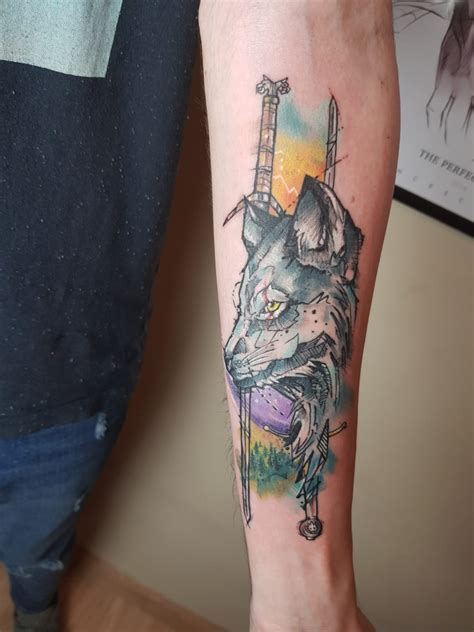 First tattoo, white wolf with steel sword and silver sword, hope you like it :) : r/witcher