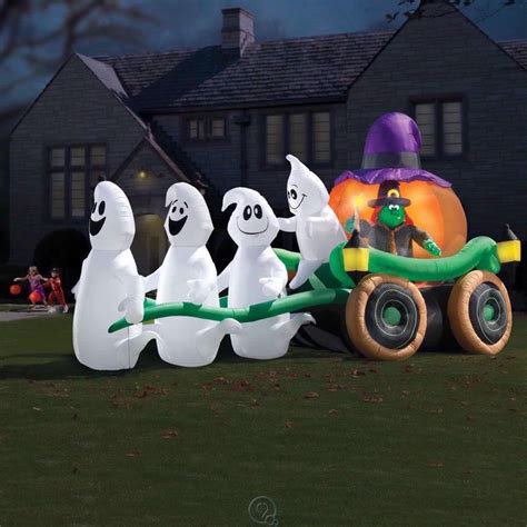 Inflatable lighted ghosts pulling a Witch in coach. Unusual yard decoration. | Halloween yard ...