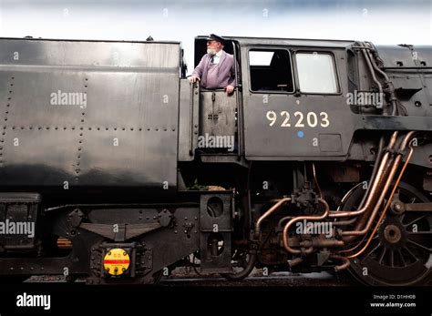 BR standard class 9f Steam Locomotive seen on the West Somerset Railway Stock Photo - Alamy