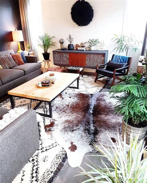 Cowhide Rug Calgary | Cowhide rug living room, Rugs in living room, Layered rugs living room