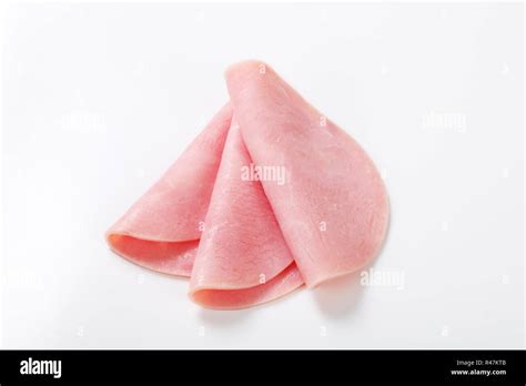 Thin slices of ham Stock Photo - Alamy