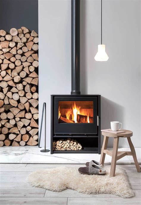 Poêle à bois : 20 modèles déco pour le salon | Contemporary wood burning stoves, Home fireplace ...