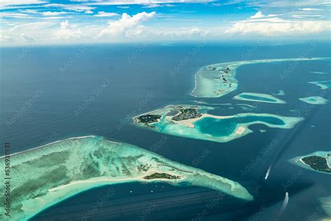 Aerial view of the Maldives islands and atolls. Maldives tourism and ...