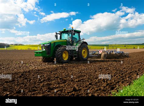 Tractor plowing field, Saxony-Anhalt, Germany Stock Photo - Alamy