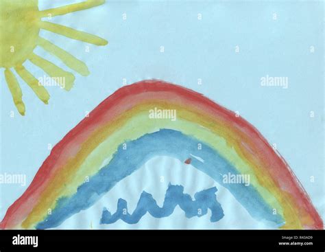 Childrens drawing - a rainbow and the sun Stock Photo - Alamy