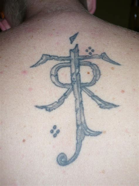 Tolkien Logo on back by gcneo on DeviantArt