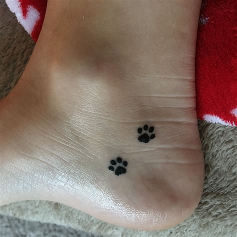 Just got this tattoo. Small paw prints on the inside my foot I LOVE IT! Mini Tattoos, Small Dog ...