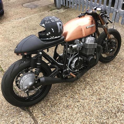 Admire the stunning copper tank on this Honda CB750 Cafe Racer