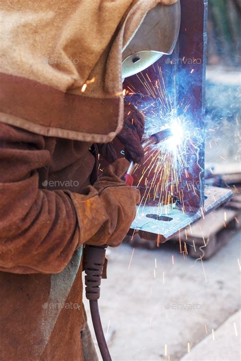 Welding work, welder welding metal material in heavy industry ...