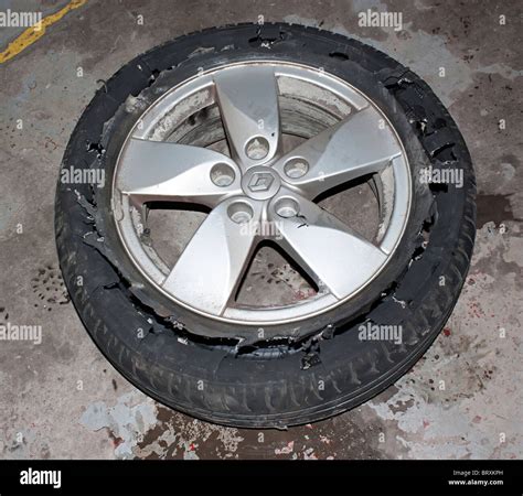 Tyre puncture hi-res stock photography and images - Alamy