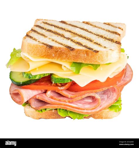 Sandwich with ham, cheese, tomato, lettuce and toasted bread isolated on a white background ...