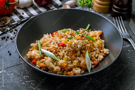 fried rice with chicken , egg and vegetables Stock Photo | Adobe Stock