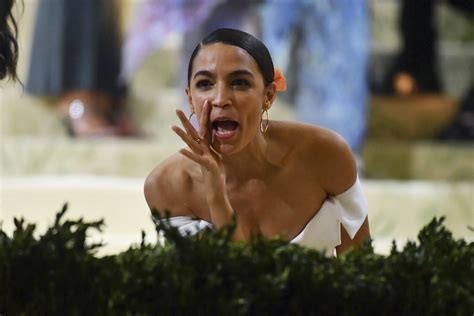 Why AOC's "Tax The Rich" Met Gala Dress Was Brilliant