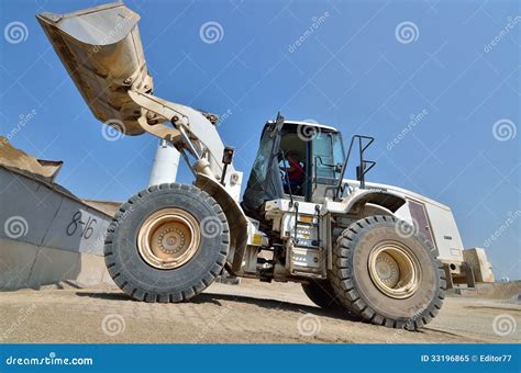 Working with Wheel Dozer at Concrete Plant Editorial Image - Image of ...