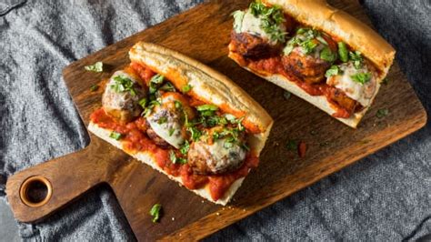 Epic 'Meatball Parm Sandwiches on Garlic Bread' Leave Us Speechless - Delishably News