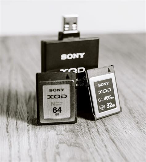 New XQD Memory Card By Sony And Reader On Table Editorial Photography - Image of fast, digital ...