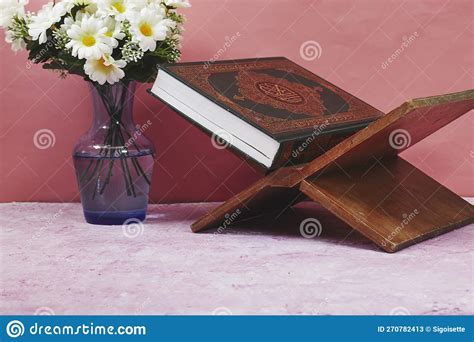 Holy Book Quran on Stand with Daisy Flowers Vase . Festive Greeting ...