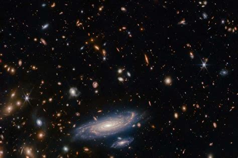 Huge young galaxies seen by JWST may upend our models of the universe | New Scientist