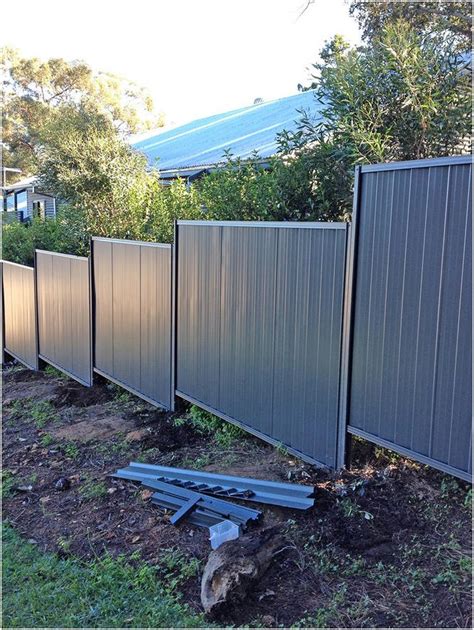 Colorbond fence installation on uneven/ sloped landscape. - Perth Trade Centre