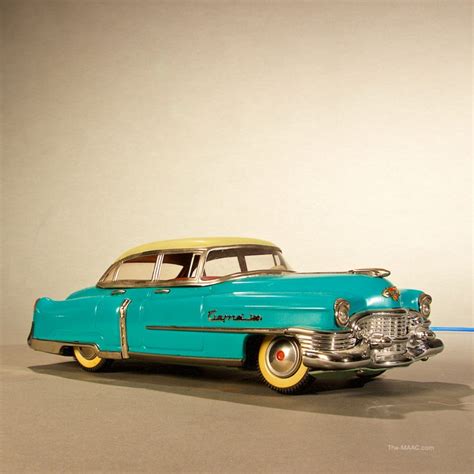 Vintage Turquoise Cadillac Toy Car - Manhattan Art and Antiques Center