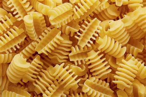 "Raw Radiatori Pasta Texture" by Stocksy Contributor "Martí Sans" - Stocksy