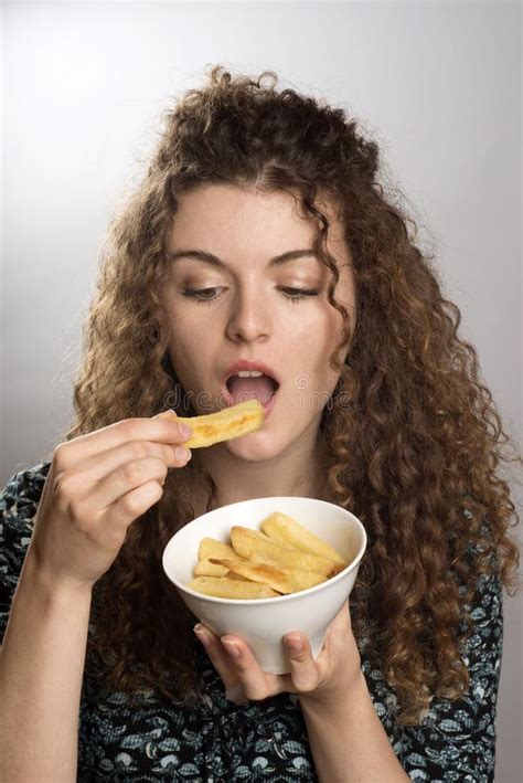 TEENAGER EATING a BOWL of CHIPS Stock Image - Image of chipped, meal: 73470161