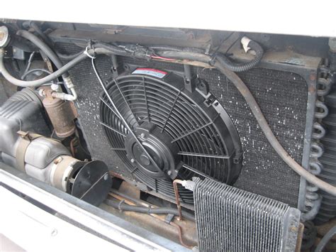 Changing the electric radiator fan and brake fluid