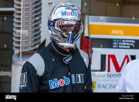 Pit crew in chrome effect helmets at the Le Mans 24hr endurance race 2014, Circuit de la Sarthe ...