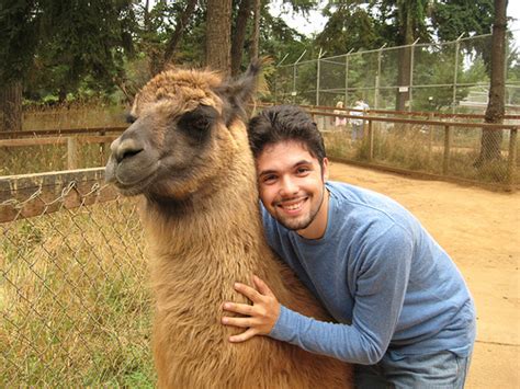 13 pictures of humans hugging animals that will make you feel better