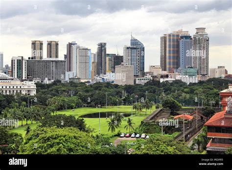 Manila city skyline in Philippines. Ermita and Paco districts seen from Intramuros Stock Photo ...