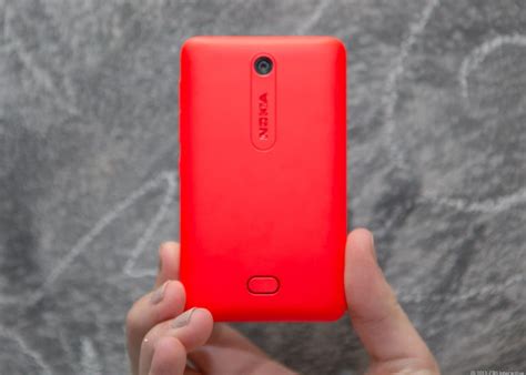 Nokia Asha 501 review: A tiny, colorful phone with budget specs - CNET