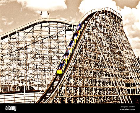 Old fashioned wooden roller coaster Stock Photo - Alamy