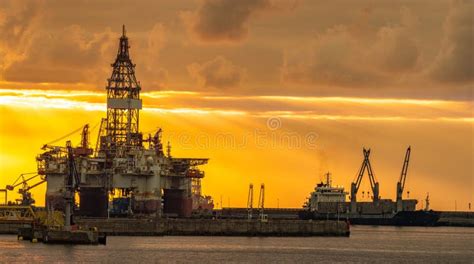 Offshore oil rig at sunset stock photo. Image of petrol - 120361956