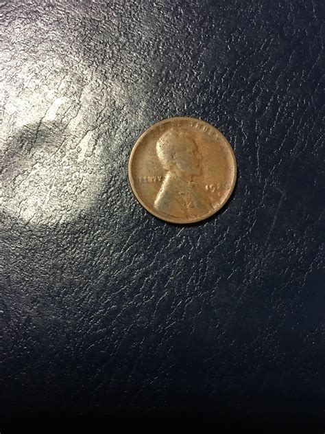 Need help identifying mint mark on this well worn 1926 penny : r/coins