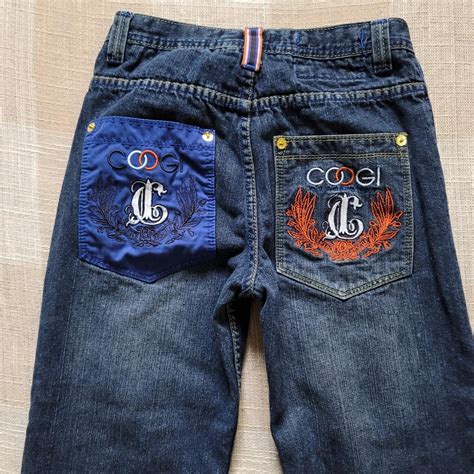 Coogi Women's Navy and Red Jeans | Depop