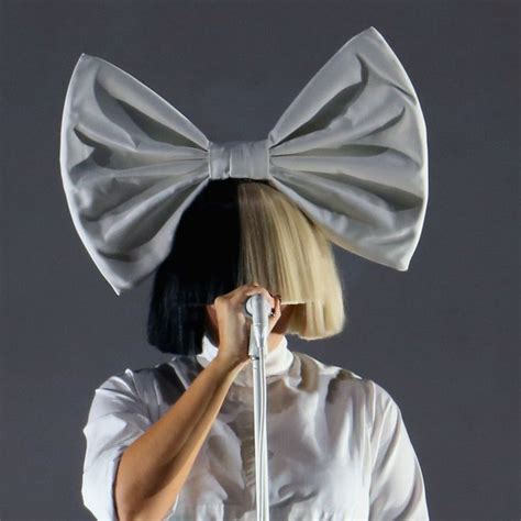 This Is Why Sia Always Covers Her Face | Sia singer, Sia kate isobelle furler, Famous singers