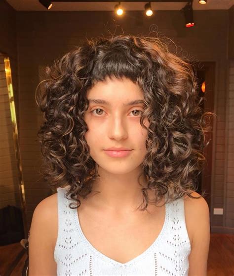 16 Best Ways to Have Curly Hair with Bangs in 2021