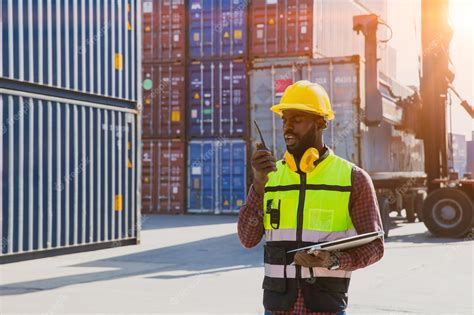 Premium Photo | Customs shipping staff worker working at cargo port container ship yard with ...