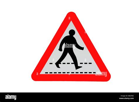 Caution Pedestrians Crossing Road Sign UK Traffic Signs Stock Photo - Alamy