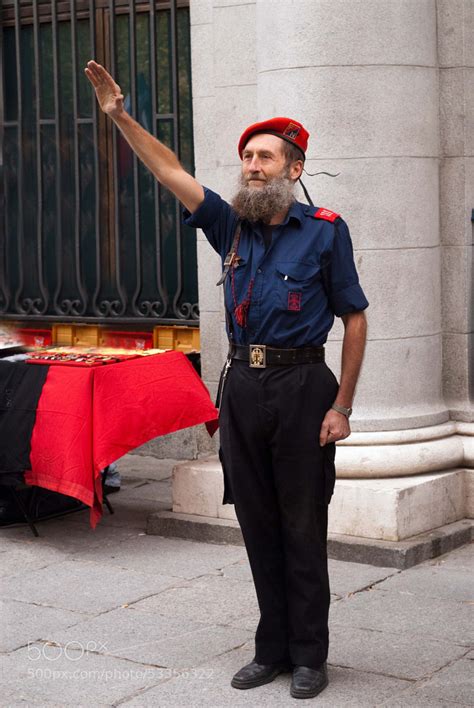 Photograph 20N. A man with the Falange's uniform, making the fascist ...