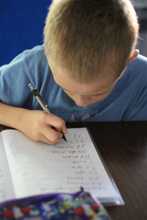 Boy writing homework stock image. Image of think, write - 781485