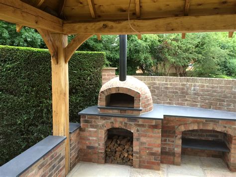 An excellent example of a pizza oven with granite sides, built from Milan 750 kit from Pizza ...