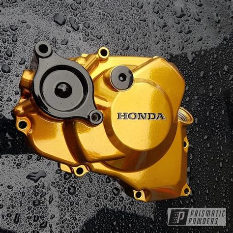 Honda Dirt Bike Parts done in Ink Black, Transparent Gold over Super Chrome | Prismatic Powders